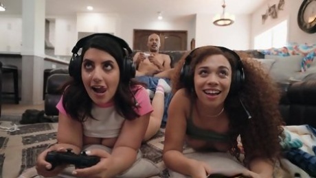 Pair of slutty dolls share black cock together during gaming session