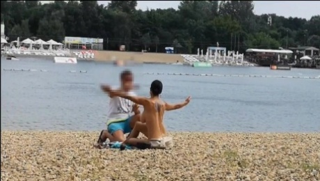 Milf Lilly naked on public beach got oil massage from stranger