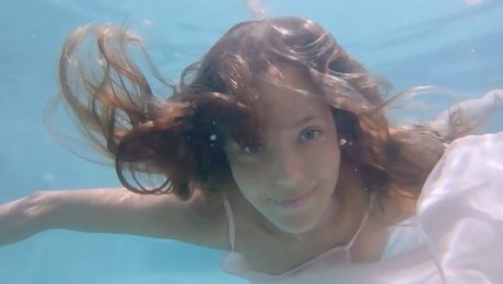 Naked Russian teasing under the water